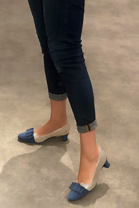 Denim blue and gold women's dress pumps, with a knot on the front. Round toe. Low kitten heels. Worn view - Florence KOOIJMAN